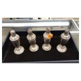 4 STERLING WEIGHTED CANDLESTICK HOLDERS