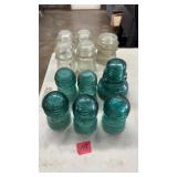 LOT OF GLASS INSULATORS: 5 CLEAR & 6 TEAL