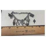 SILVER CHARM BRACELET W/ ASST CHARMS