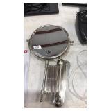 ADJUSTABLE MOUNTING MAGNIFYING MIRROR