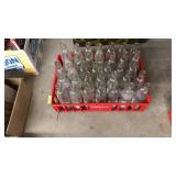 CRATE OF SUN-RIPE GLASS SODA BOTTLES