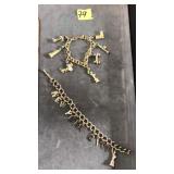 (2) GOLD TONE CHARM BRACELETS: NYC