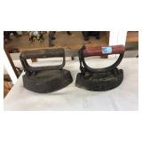 (2) WOOD HANDLE CAST IRON SAD IRONS