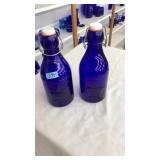 PAIR OF COBALT BLUE GLASS PURE MILK JUGS