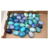 COLLECTION OF BLUE POLISED STONE EGGS
