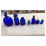 LOT OF ASST SIZE COBALT BLUE GLASS BOTTLES