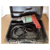 3/8" Milwaukee corded drill in DeWalt case. Works.