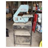 Delta table top band saw on stand. 22"x53ï¿½x16ï¿½.