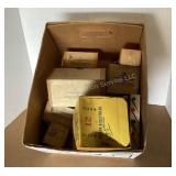 Shotgun shell boxes and wadding for reloading