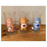 Three 1983 Care Bear Glasses