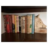 Shelf of Books with Pig Bookend