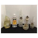 Assorted oil lamps and lamp oil