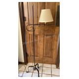 55 1/2" tall black iron floor lamp, works