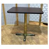 Metal pedestal base table