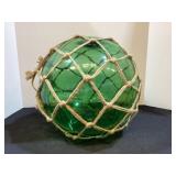 Large green glass fish float, 11" diameter