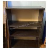 Small pressboard bookshelf