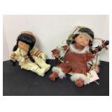 2 porcelain Native American dolls