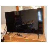 LG TV with remote, works