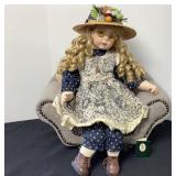 Geppeddo porcelain doll & chair
