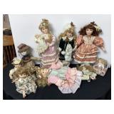 9 porcelain dolls