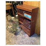 Bookshelf, books, and glass