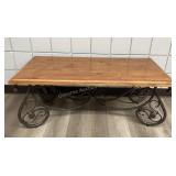 Coffee table with scroll metal legs