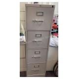 4 Drawer HON file cabinet, 15x28.5x52" tall
