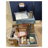 Bins, box of plastic spoons, bags, floating