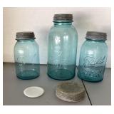 3 blue Ball canning jars with zinc lids