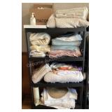 Plastic Shelving Unit, Blankets, shower curtain,