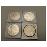 Four Peace Silver Dollars
