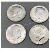 Four 1964 Kennedy half dollars