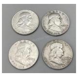Four 1963 Franklin half dollars
