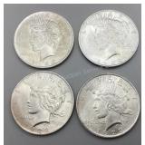 Four 1923 Peace Silver Dollars