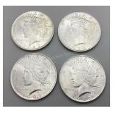 Four 1923 Peace Silver Dollars