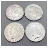 Four 1922 Peace Silver Dollars