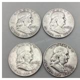 Four 1952 Franklin Half Dollars
