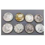 Eight 1964 Kennedy Half Dollars