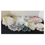 Large collection of doilies, clean