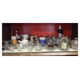 Shelf of pedestal dishes, condiment jars,