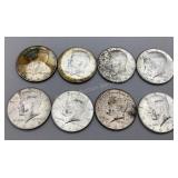 Eight 1964 Kennedy Half Dollars