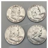 Four 1954 Franklin half dollars