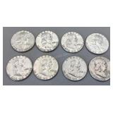 Eight 1961 Franklin Half Dollars