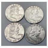 Four 1960 Franklin Half Dollars