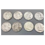 Eight 1960 Franklin Half Dollars