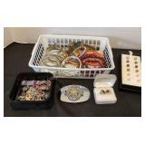Bracelets, earrings, belt buckle