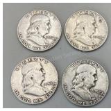 Four 1952 Franklin half dollars