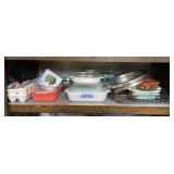 Shelf of bakeware, casserole dishes, pie crust