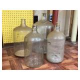 4 glass carboy jugs