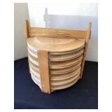 12 wood chargers in carrier, 12 1/2" diameter